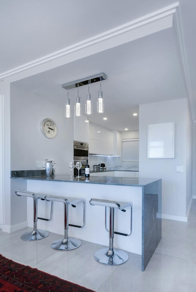 pexels-photo-1454805-1454805 Sleek modern kitchen interior in Cape Town showcasing contemporary design elements.